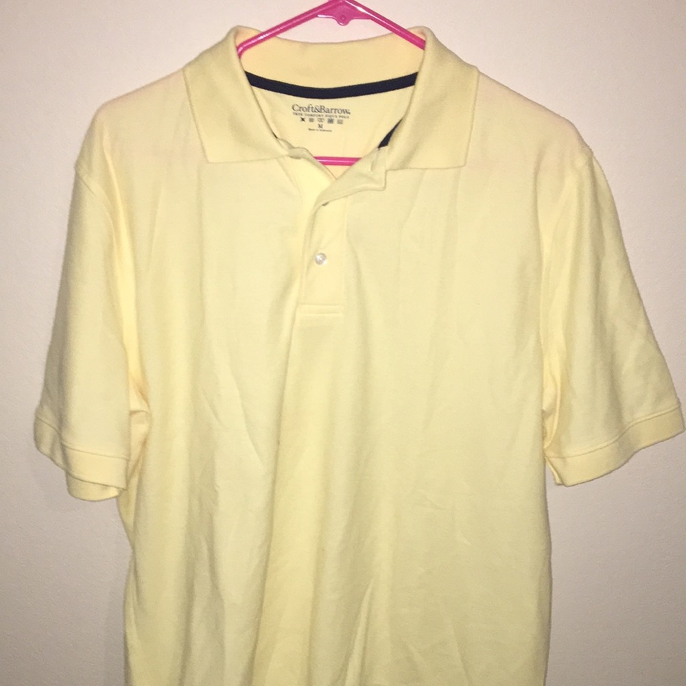 long pastel yellow collared polo shirt